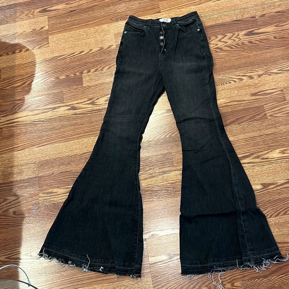 We the free (free people) black washed super flare button fly Jean